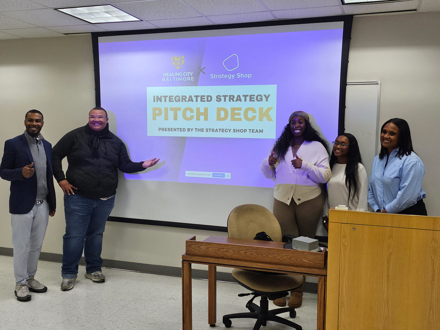 Morgan State University students presenting final strategy deck to class