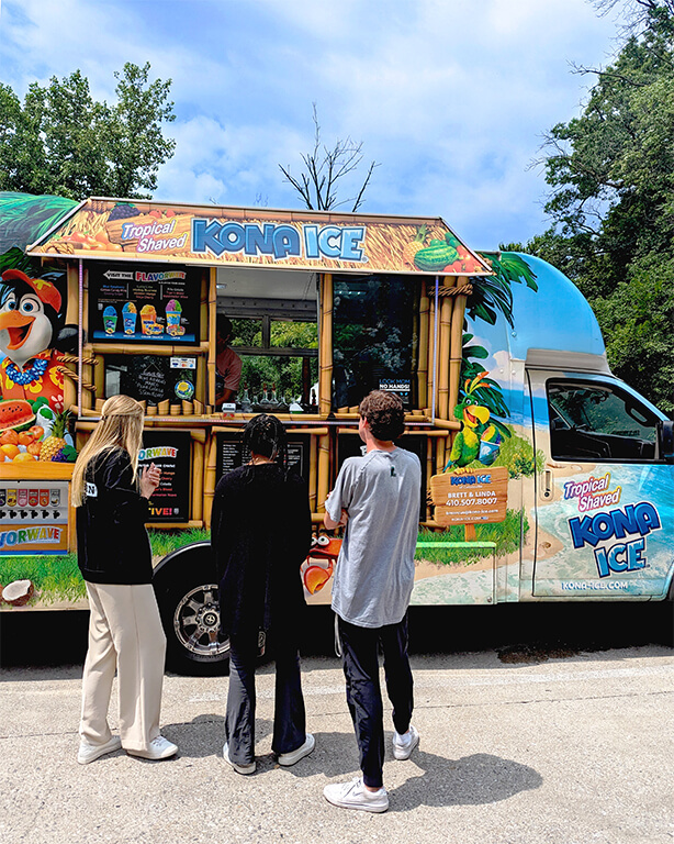 Mission Interns waiting in line for tropical shaved ice