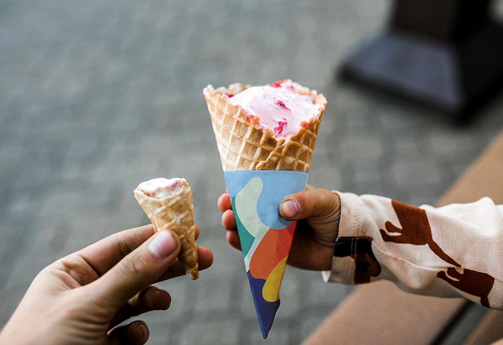 two ice cream cones wrapped in colorful Waterfront Baltimore wrapping paper