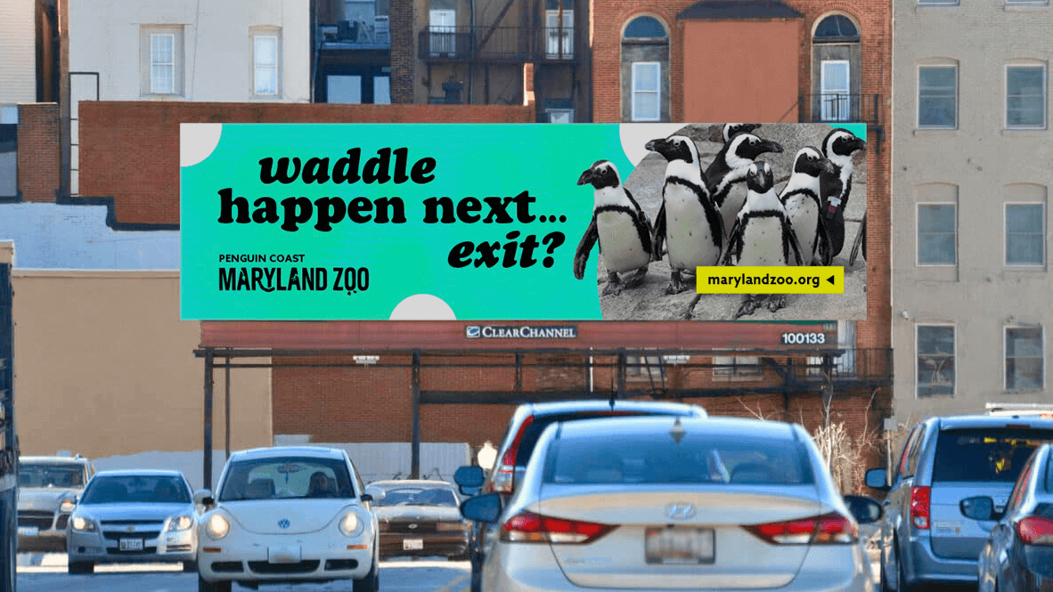 A highway billboard reading,