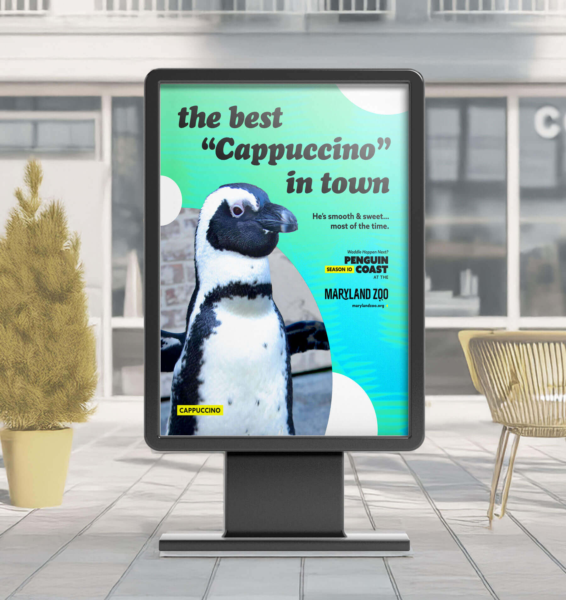An advertisement outside of a coffee shop saying,