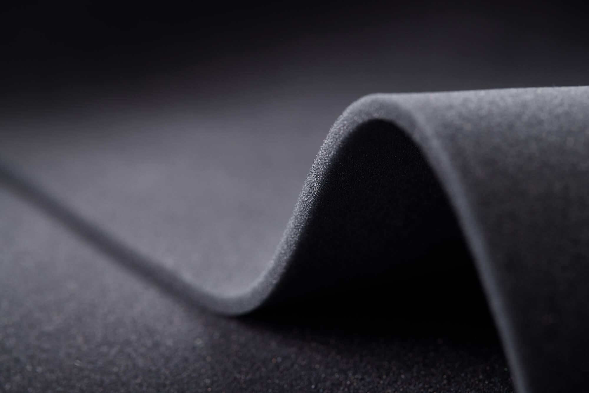 A foam sample unrolled in studio setting