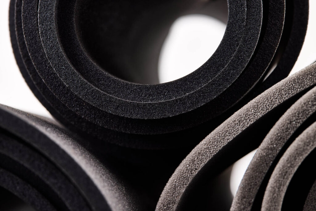A roll of foam samples photographed in studio